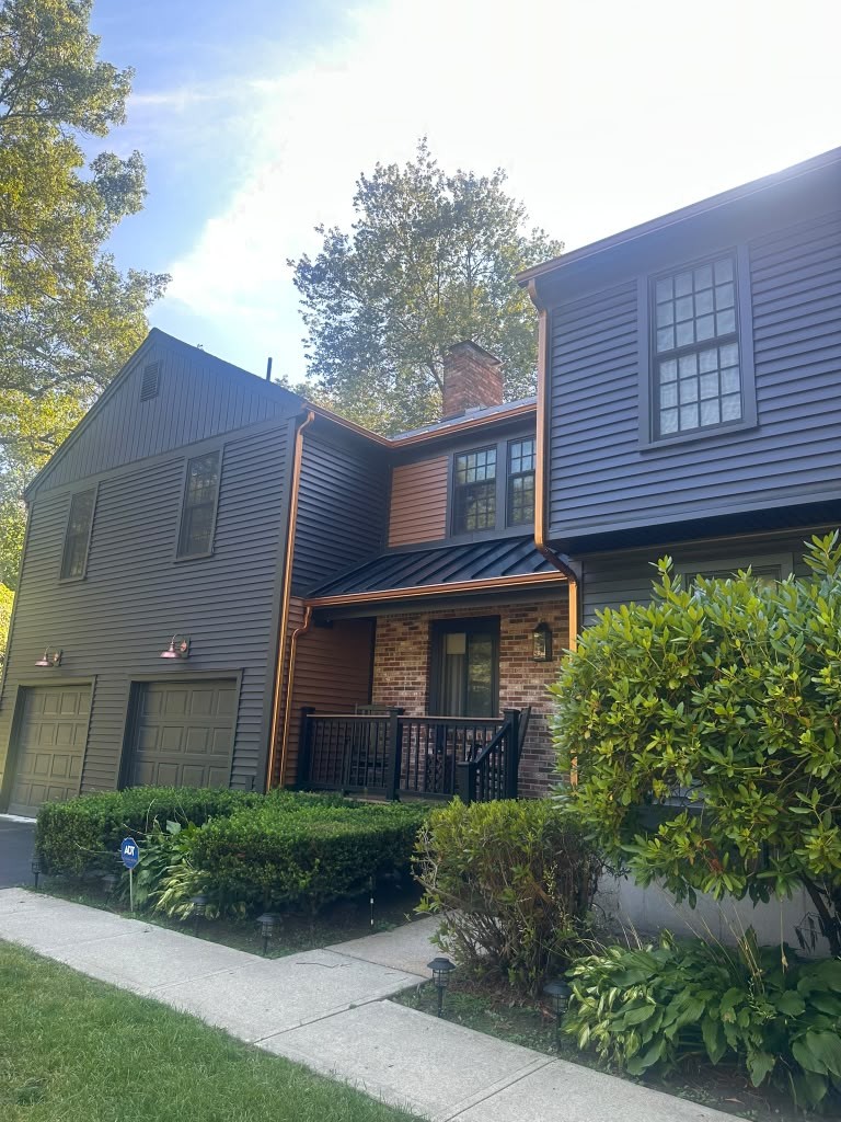 Dark Exterior Repaint — Sypriano Construction